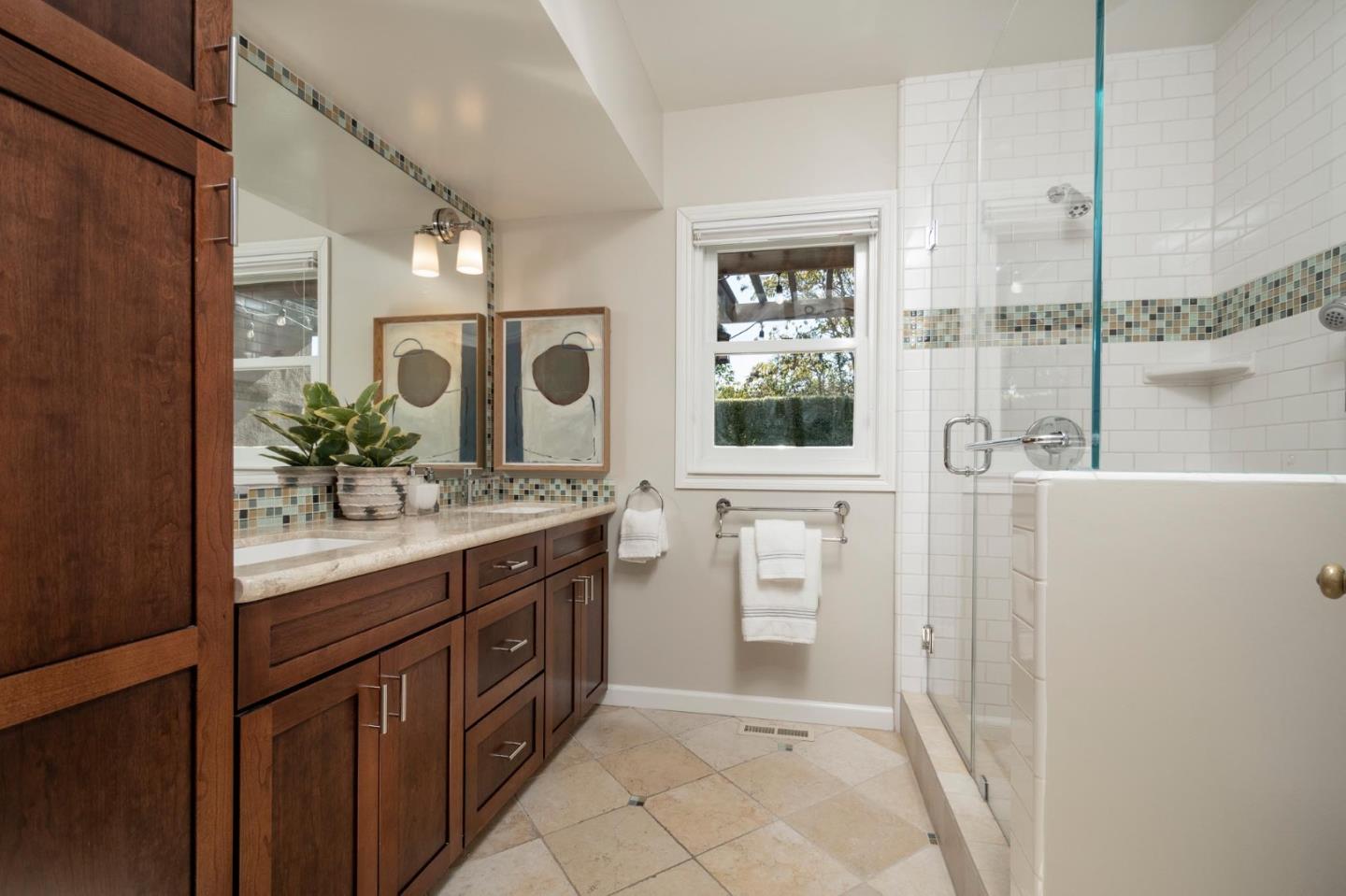 405 29th Avenue San Mateo, CA 94403 - Photo 12 of 22 a bathroom with a granite countertop sink and a mirror