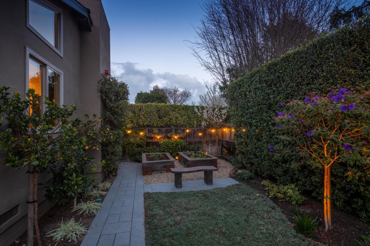 405 29th Avenue San Mateo, CA 94403 - Photo 19 of 22 a bench sitting in middle of a yard