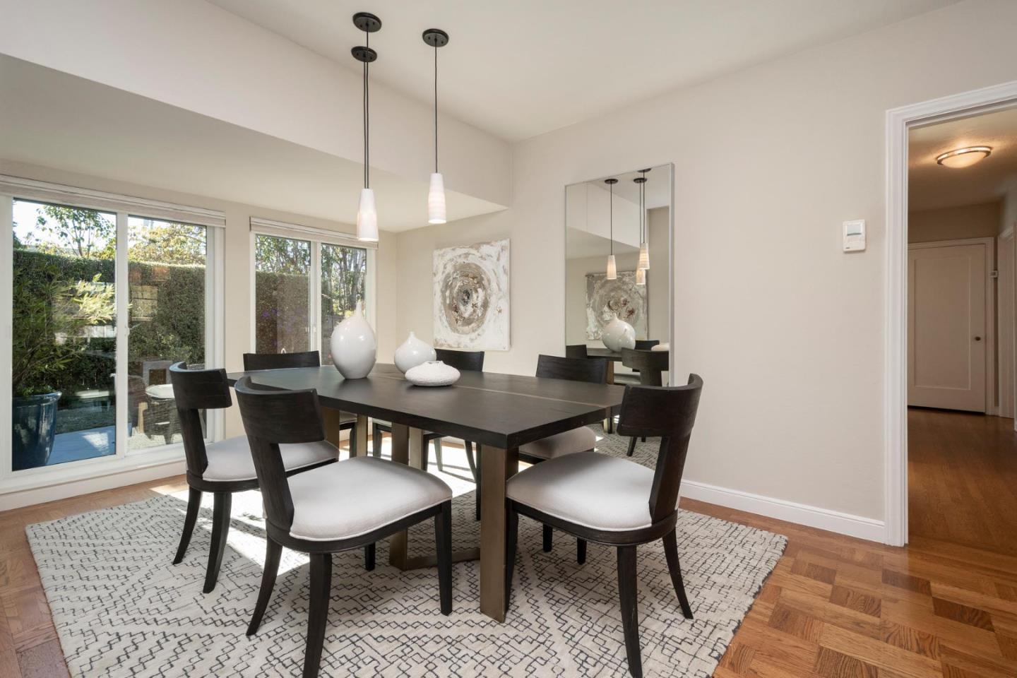 405 29th Avenue San Mateo, CA 94403 - Photo 4 of 22 a view of a dining room with furniture window and wooden floor