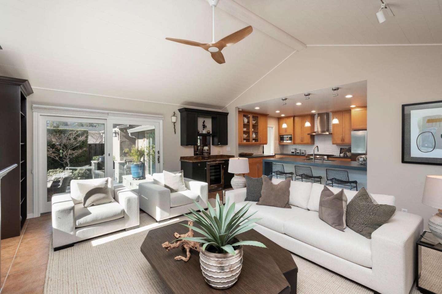 405 29th Avenue San Mateo, CA 94403 - Photo 6 of 22 a living room with furniture kitchen view and a chandelier