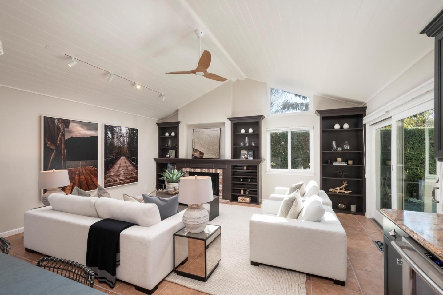 405 29th Avenue San Mateo, CA 94403 - Photo 9 of 22 a living room with furniture and large windows