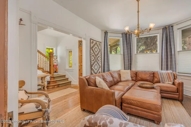 a bathroom with a toilet a sink and a mirror