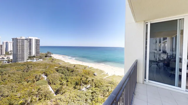 a kitchen with a stove a sink and a refrigerator