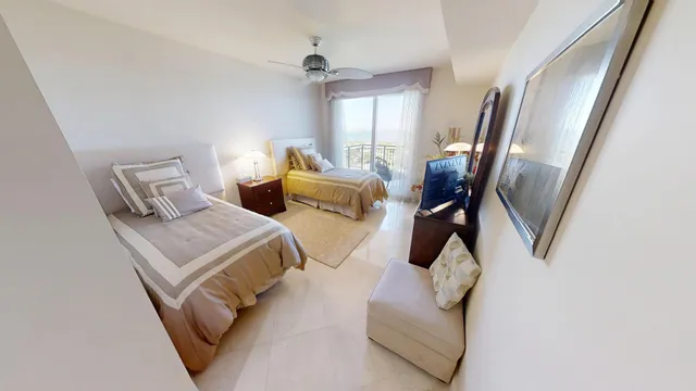 a view of swimming pool with outdoor seating