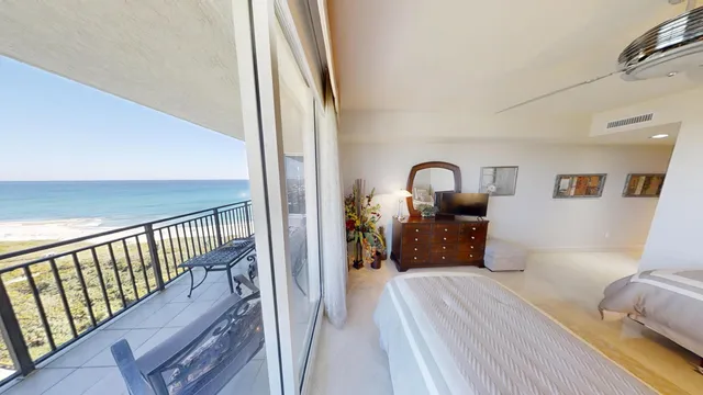 a living room with furniture fireplace and flat screen tv