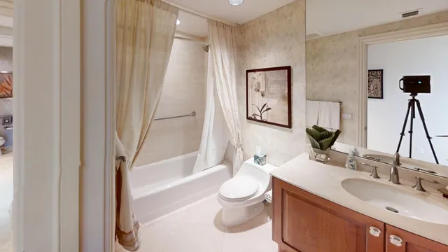 a couple of cars parked in front of a building