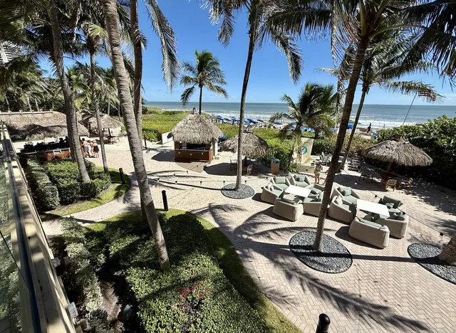 a view of a buildings with roof deck