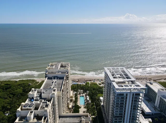 a view of building with ocean view
