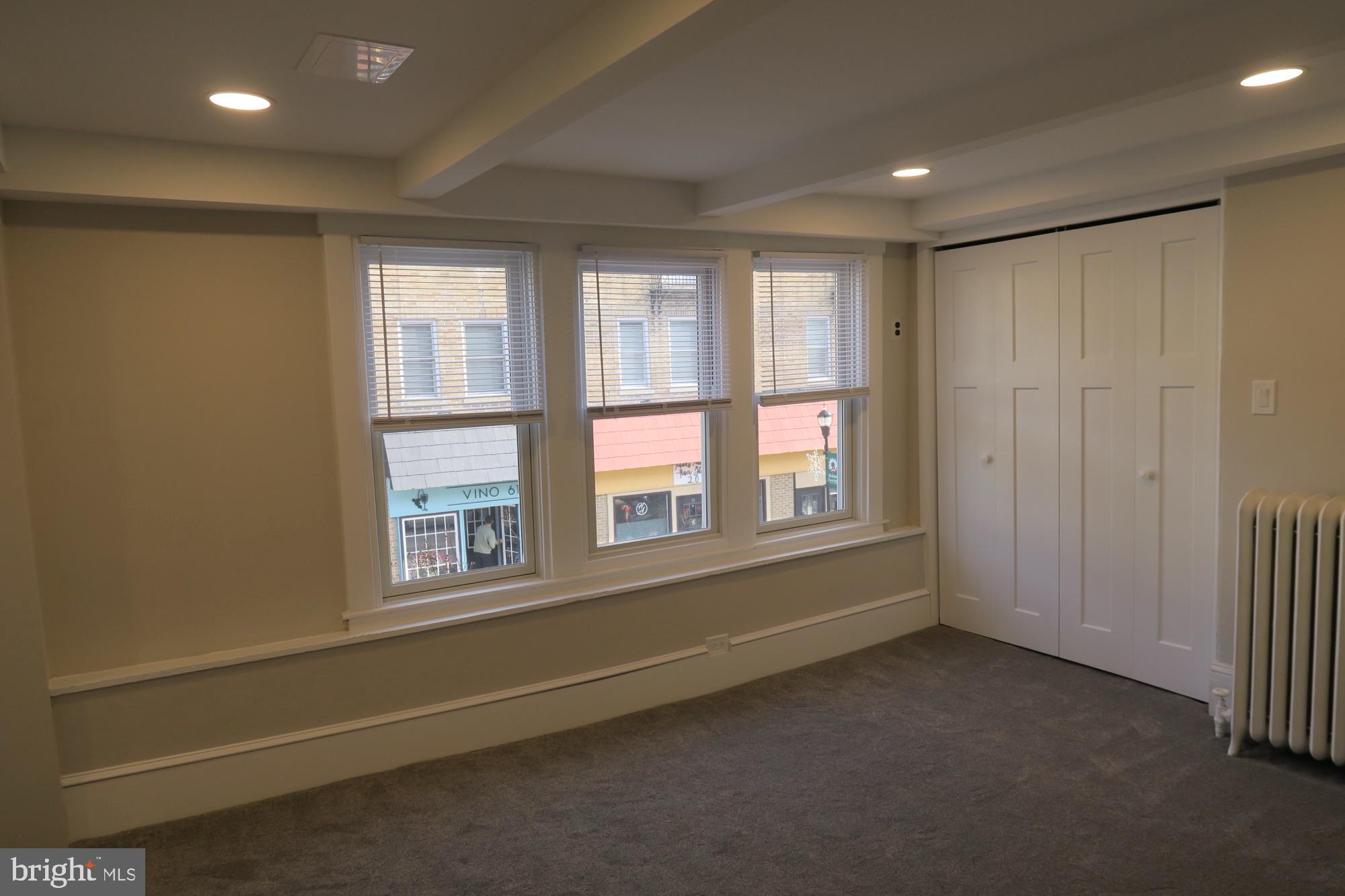 66 High Street Mount Holly, NJ 08060 - Photo 16 of 18 a view of an empty room with a window
