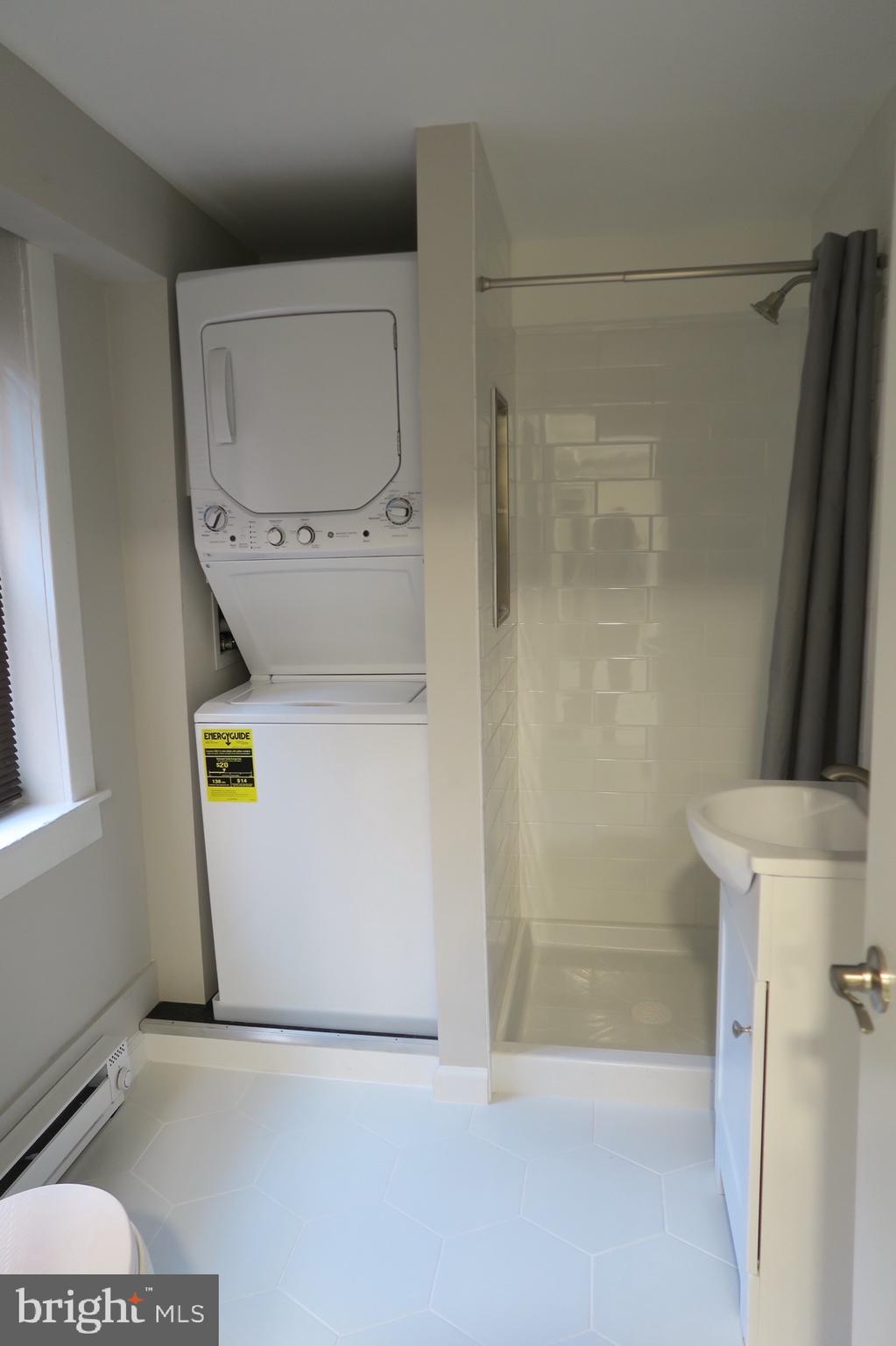 66 High Street Mount Holly, NJ 08060 - Photo 8 of 18 a view of storage and utility room with a washer dryer