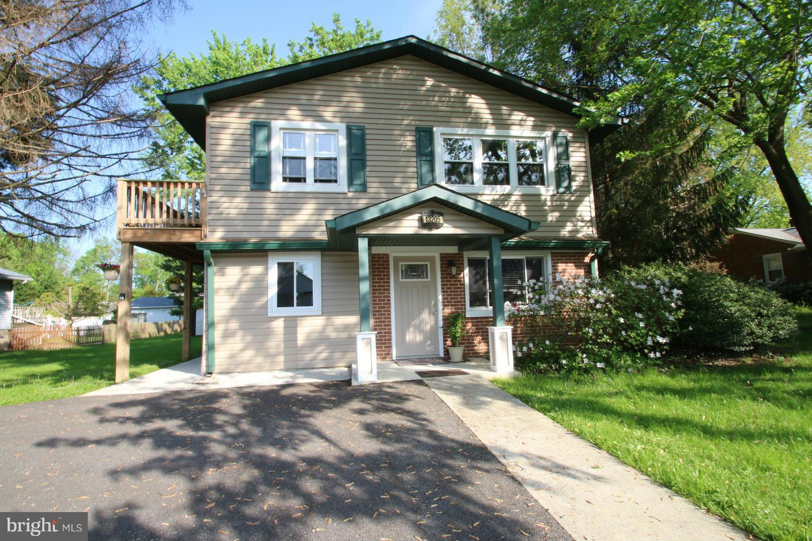 13205 Choptank Road Baltimore, MD 21220 - Photo 2 of 30 a front view of a house with a yard