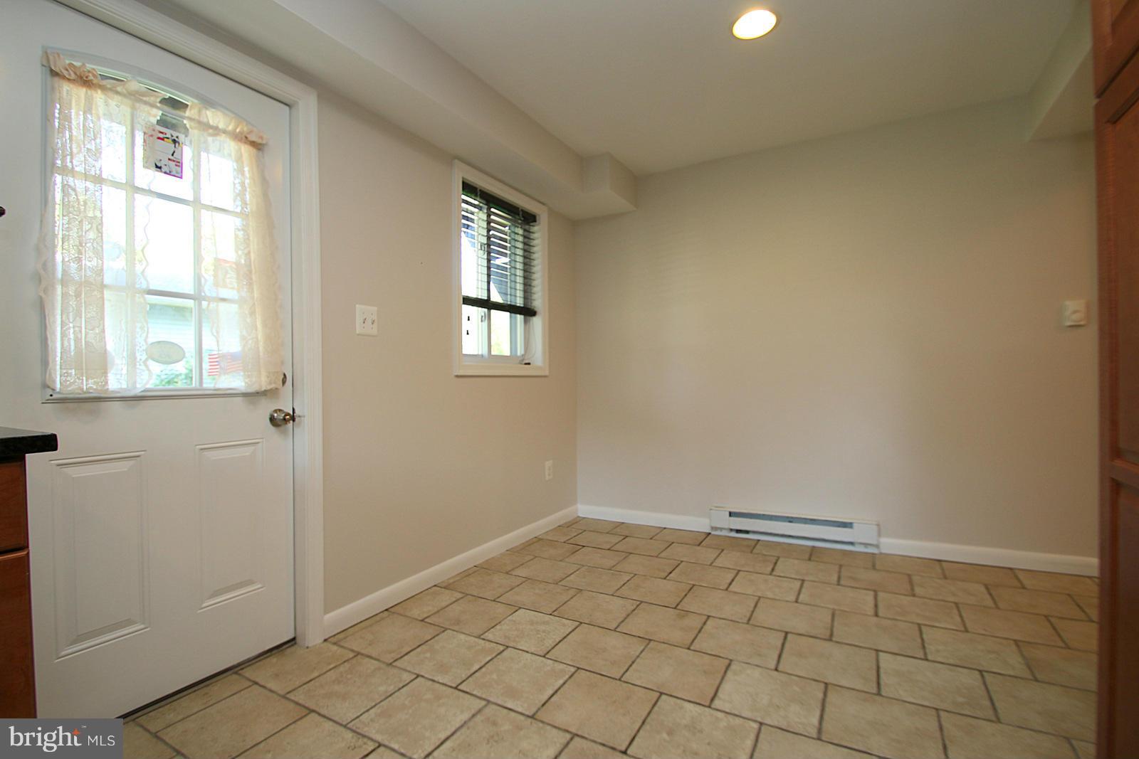 13205 Choptank Road Baltimore, MD 21220 - Photo 16 of 30 a view of an empty room and window