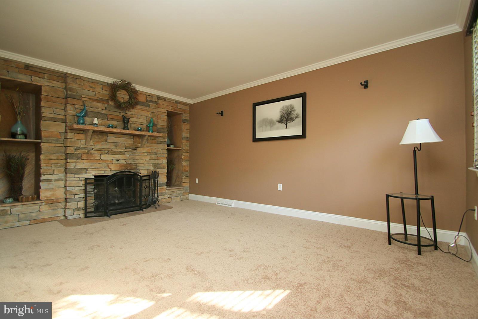13205 Choptank Road Baltimore, MD 21220 - Photo 20 of 30 a view of a livingroom with a fireplace