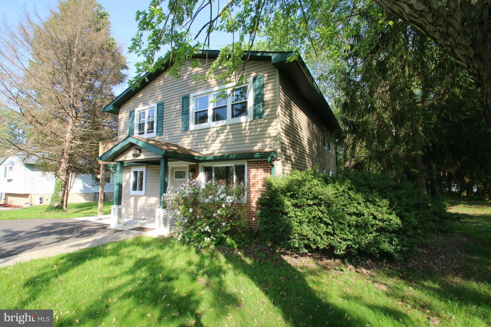 13205 Choptank Road Baltimore, MD 21220 - Photo 5 of 30 a front view of a house with a yard