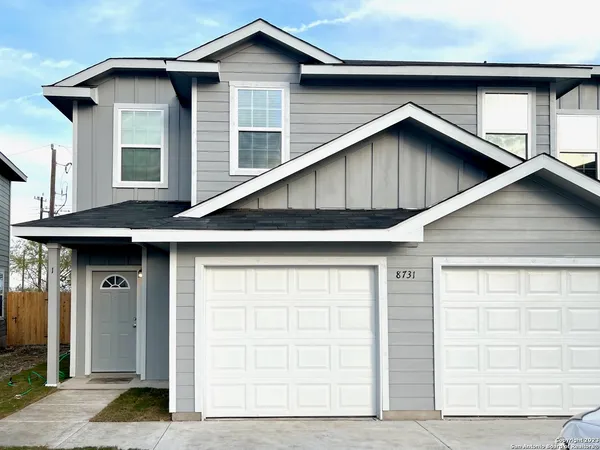 a view of a house with garage