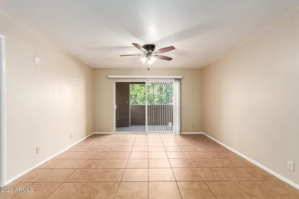 a view of a hallway with a chandelier