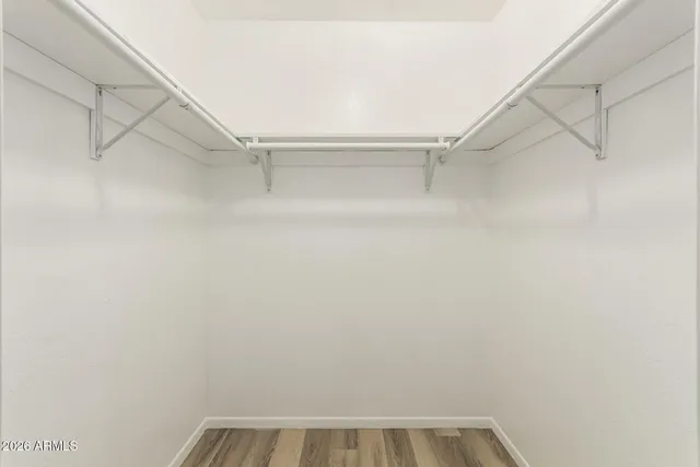 a view of a livingroom with a ceiling fan