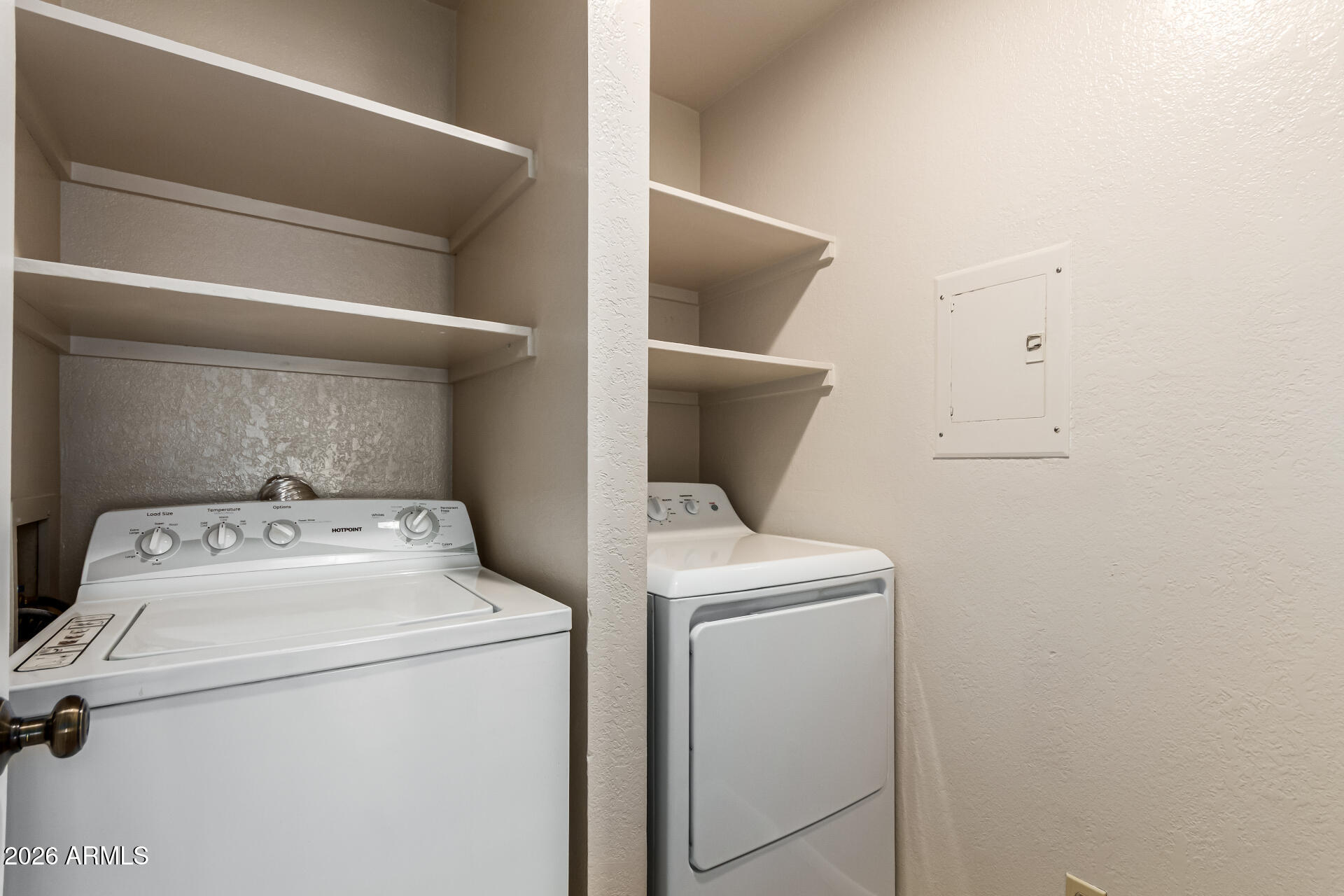 540 North May, Unit 3102 Mesa, AZ 85201 - Photo 27 of 45 a utility room with dryer and washer