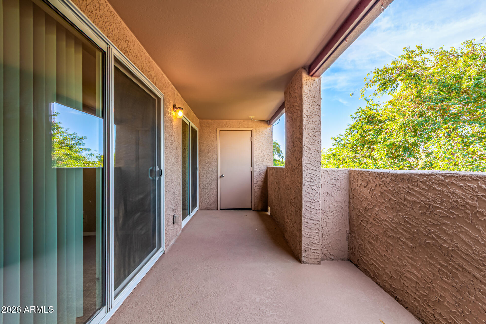 540 North May, Unit 3102 Mesa, AZ 85201 - Photo 29 of 45 a view of a house with a backyard