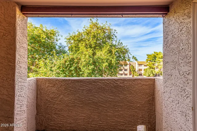 a picture of a building with a ocean view