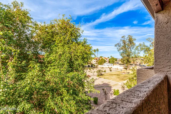a view of street with tall buildings