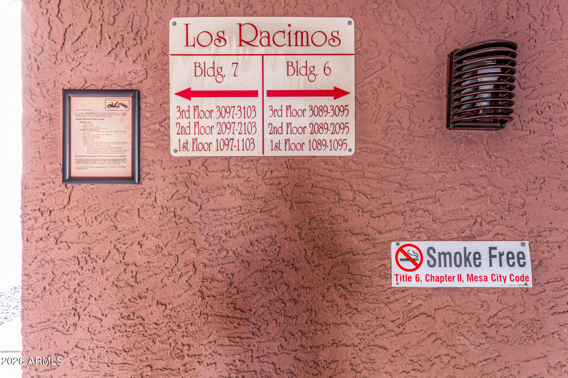 540 North May, Unit 3102 Mesa, AZ 85201 - Photo 36 of 45 a sign broad in front of a brick wall