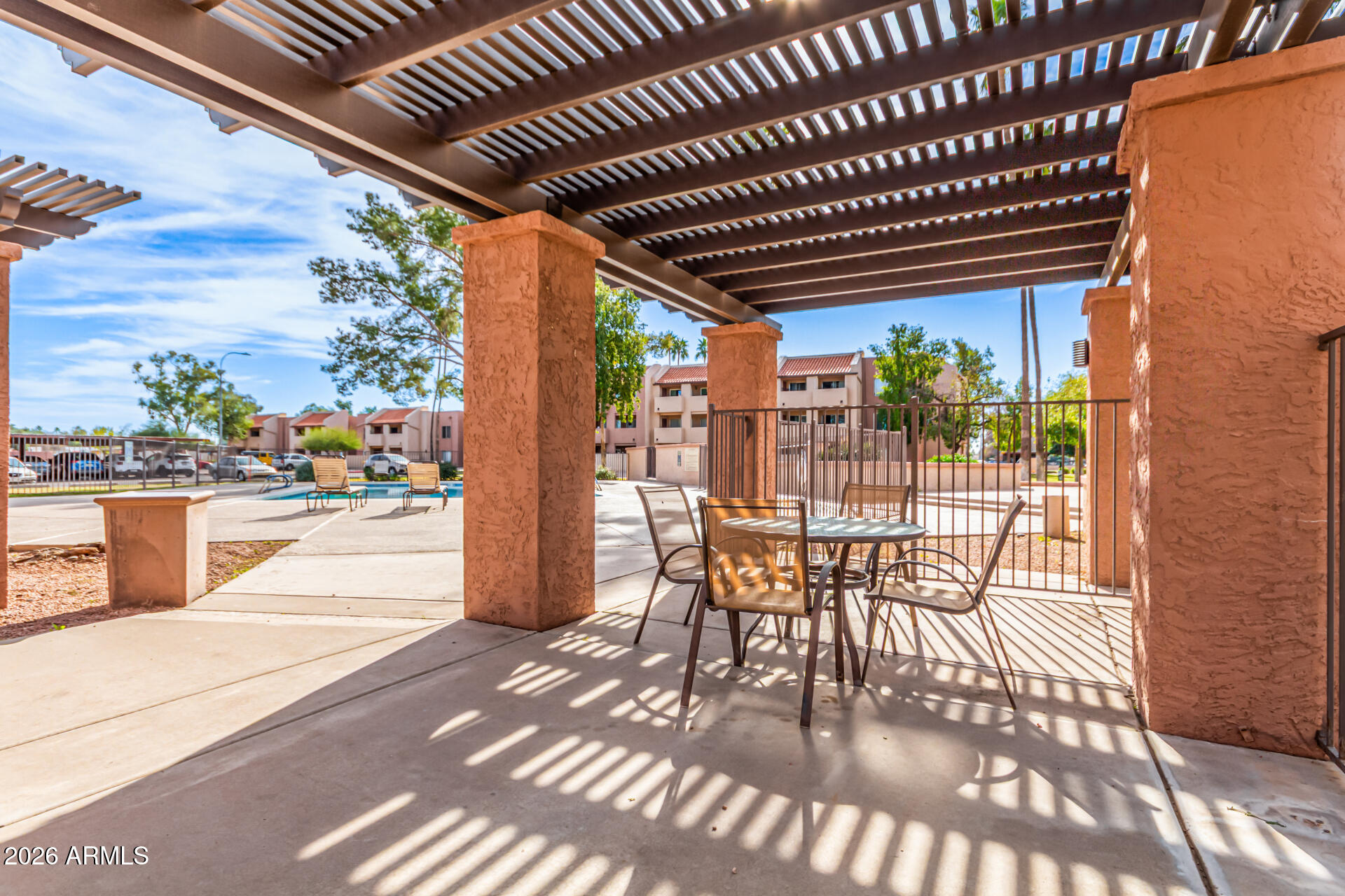 540 North May, Unit 3102 Mesa, AZ 85201 - Photo 41 of 45 a view of a patio outdoor dining space with a patio