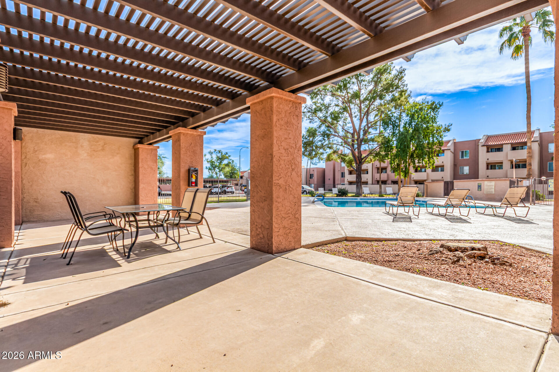 540 North May, Unit 3102 Mesa, AZ 85201 - Photo 42 of 45 a outdoor view with a sitting space