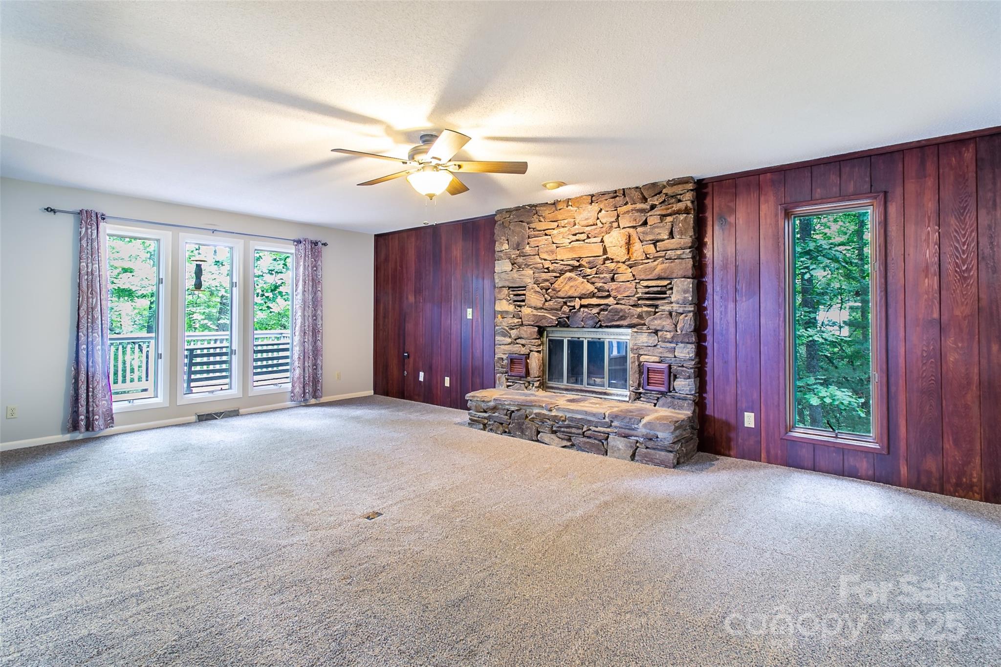 162 Southerland Road Pisgah Forest, NC 28768 - Photo 12 of 41 a view of livingroom with furniture fan and window