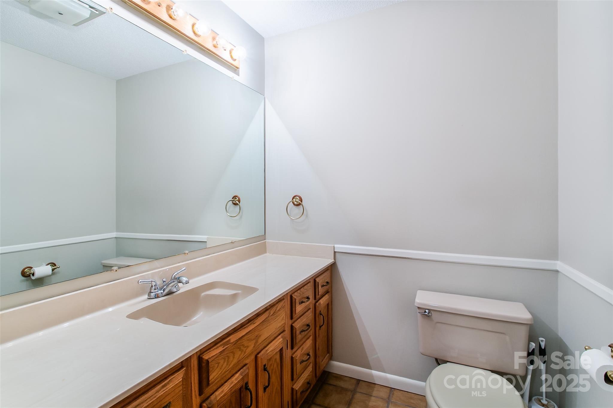 162 Southerland Road Pisgah Forest, NC 28768 - Photo 17 of 41 a bathroom with a sink a toilet and shower