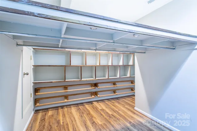 a view of bedroom with a closet