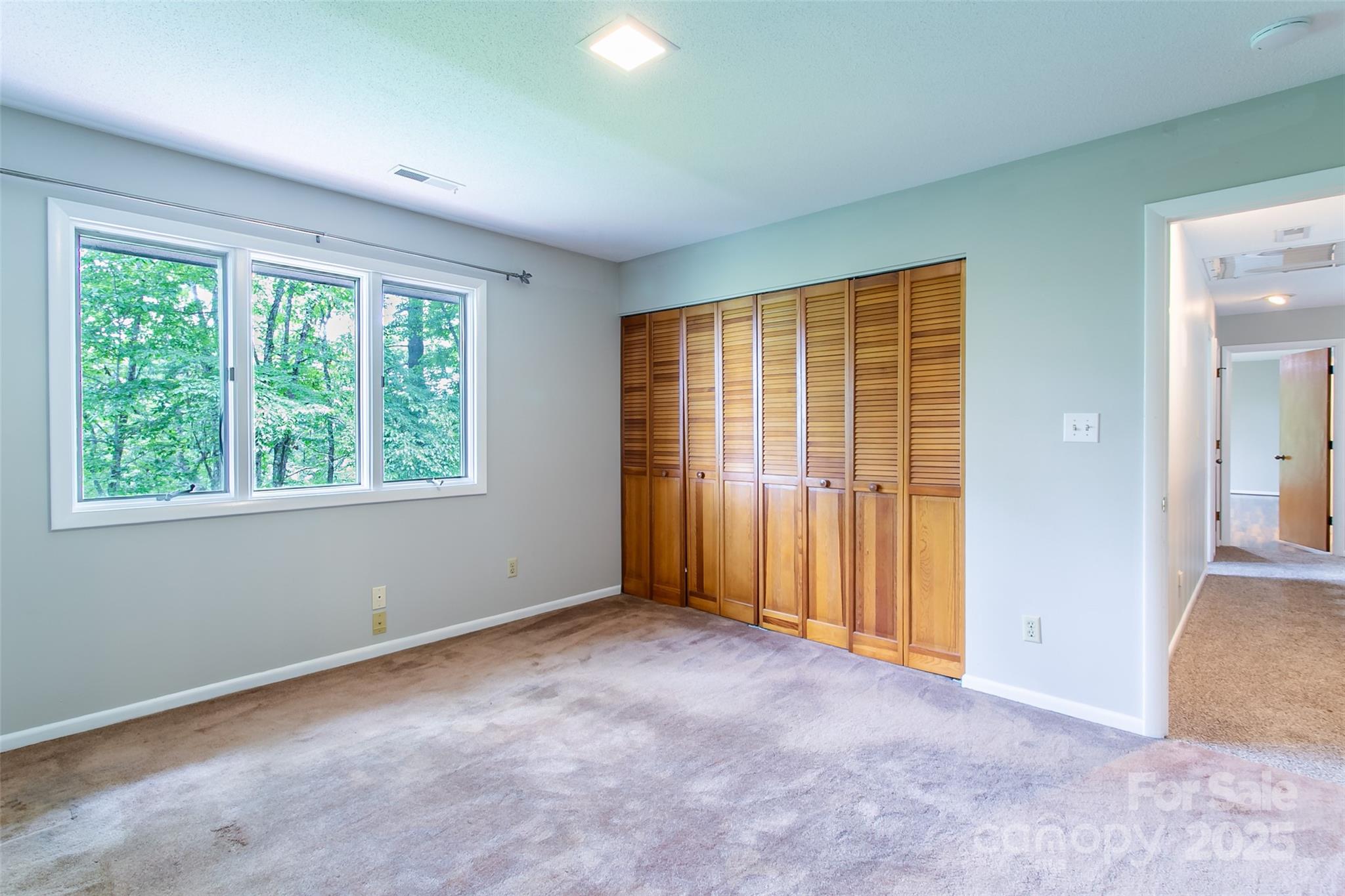 162 Southerland Road Pisgah Forest, NC 28768 - Photo 32 of 41 an empty room with windows