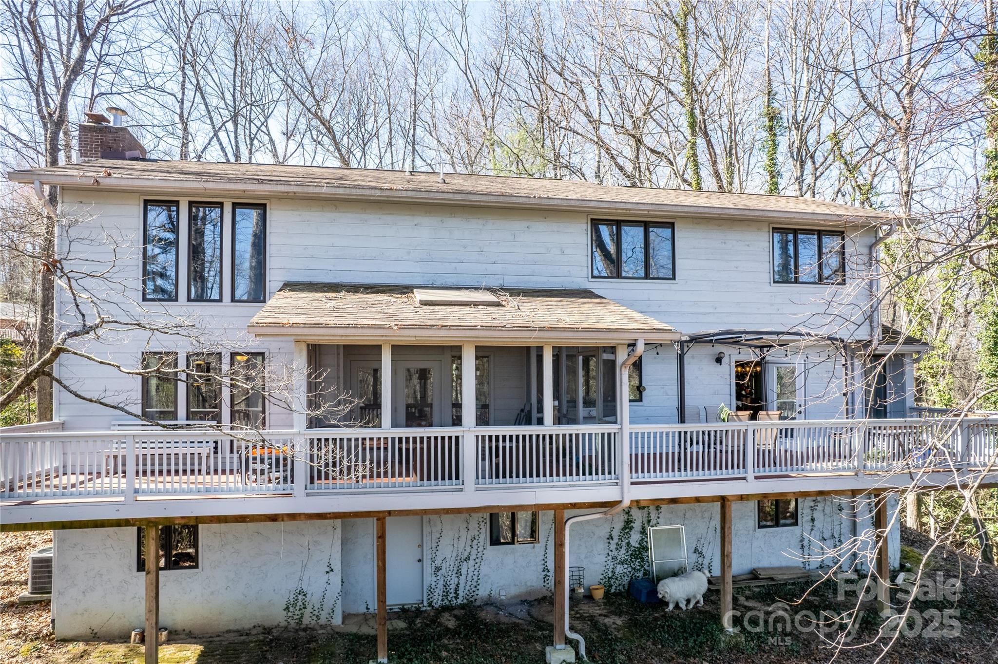 162 Southerland Road Pisgah Forest, NC 28768 - Photo 39 of 41 a front view of a building with balcony