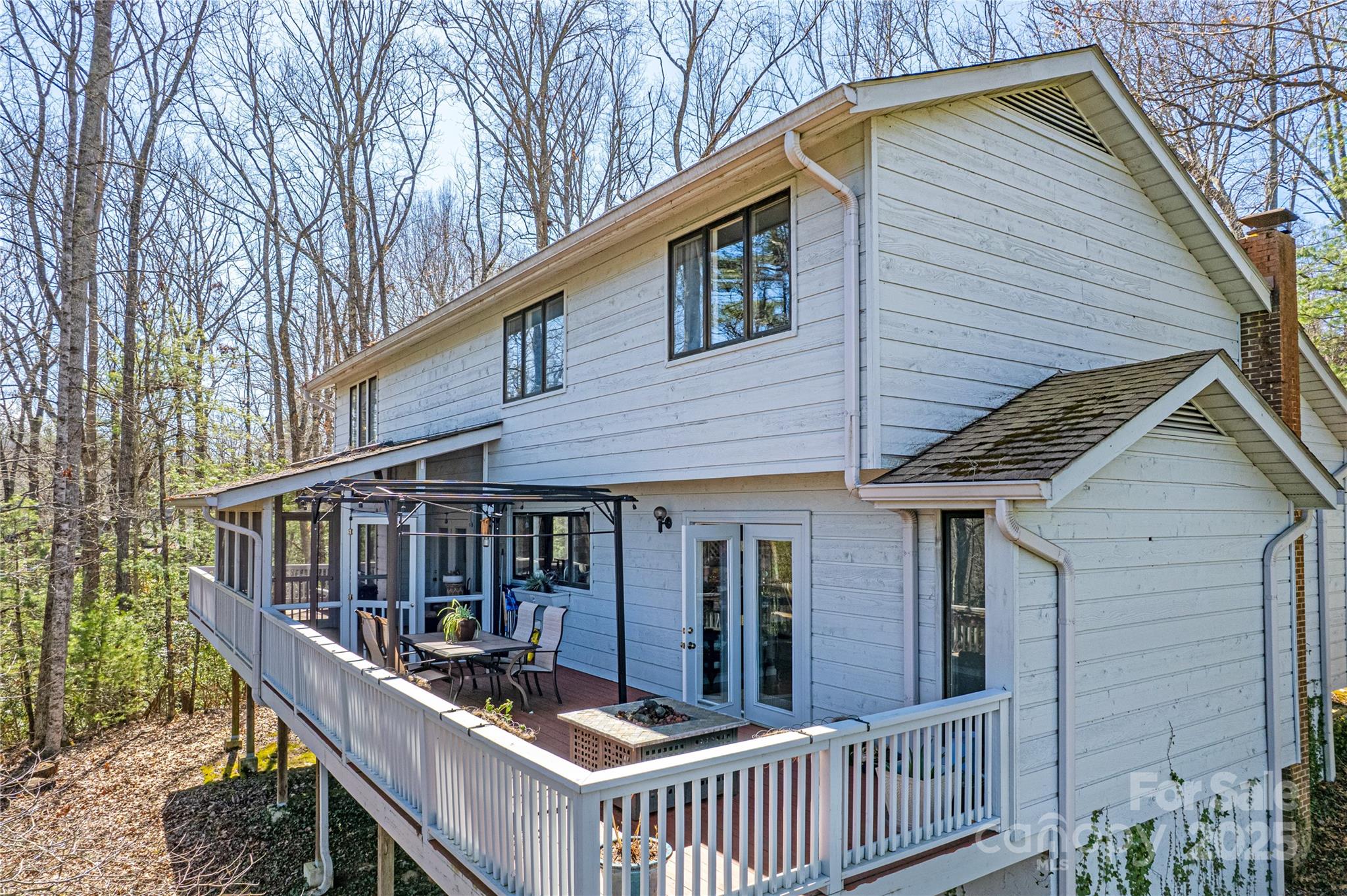 162 Southerland Road Pisgah Forest, NC 28768 - Photo 40 of 41 a front view of a house with balcony