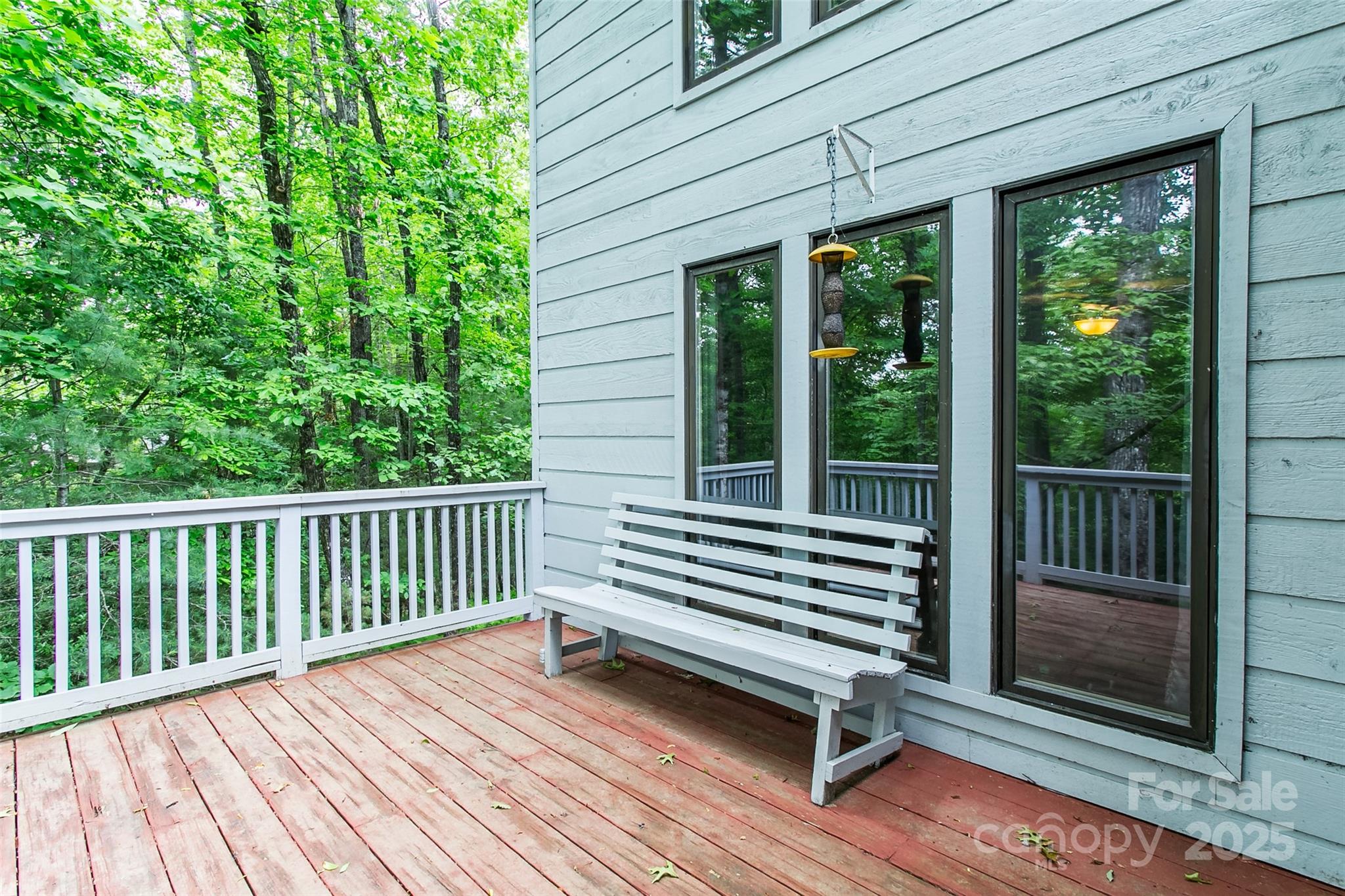 162 Southerland Road Pisgah Forest, NC 28768 - Photo 5 of 41 a view of a two chairs in the balcony