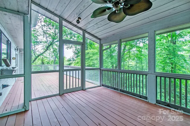 a view of balcony with wooden floor