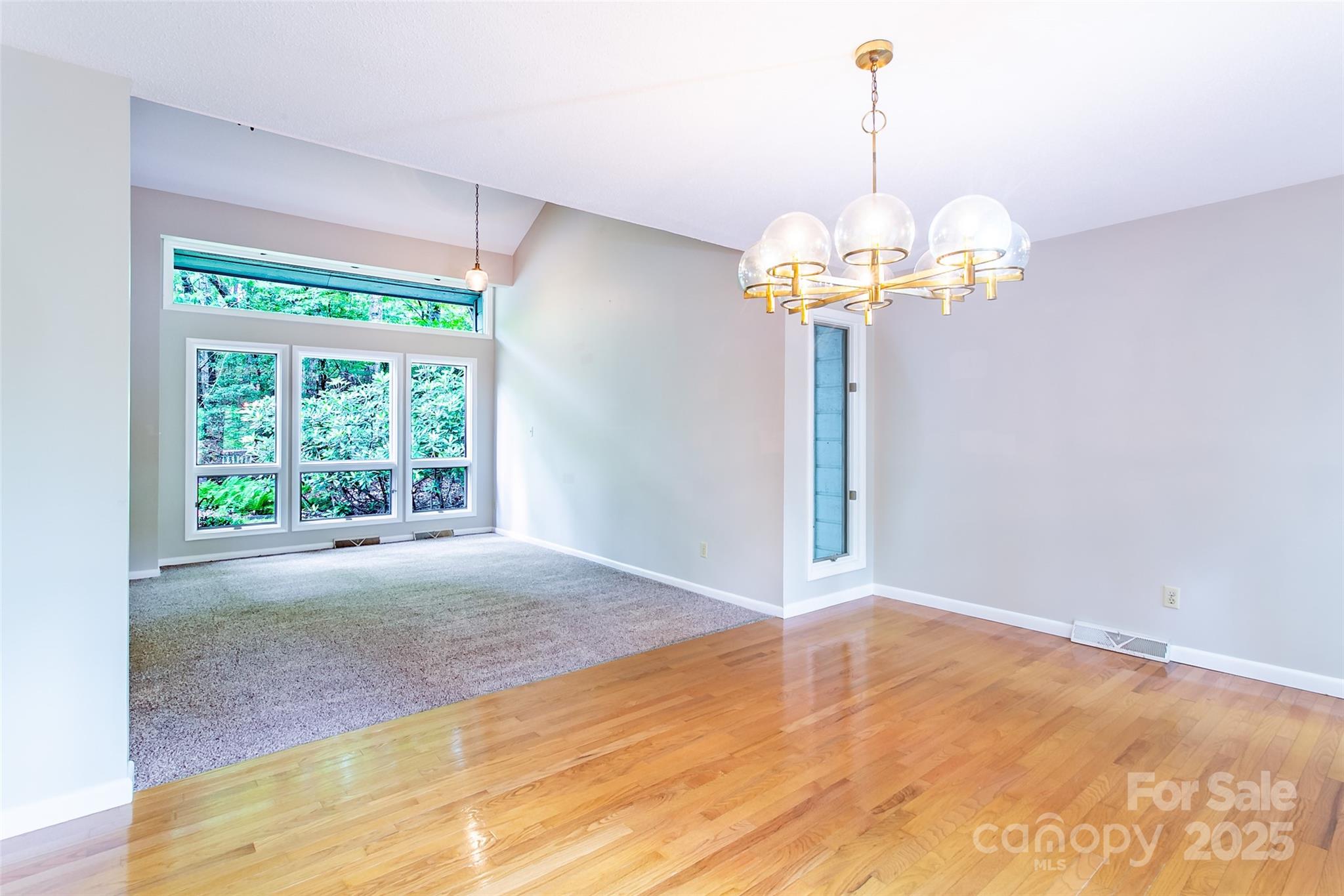 162 Southerland Road Pisgah Forest, NC 28768 - Photo 8 of 41 a view of a room with a chandelier and chandelier