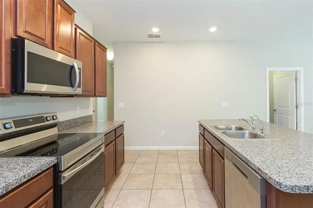 $310,000 | 10040 Carloway Hills Drive, Unit 10040, Wimauma, FL 33598