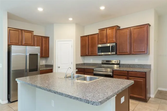 $310,000 | 10040 Carloway Hills Drive, Unit 10040, Wimauma, FL 33598