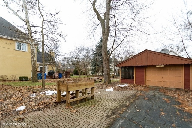 326 North County Line Road Hinsdale, IL 60521 - Photo 11 of 12 a view of a house with backyard and sitting area