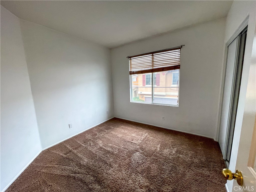 33570 Emerson Way, Unit C Temecula, CA 92592 - Photo 30 of 52 an empty room with windows
