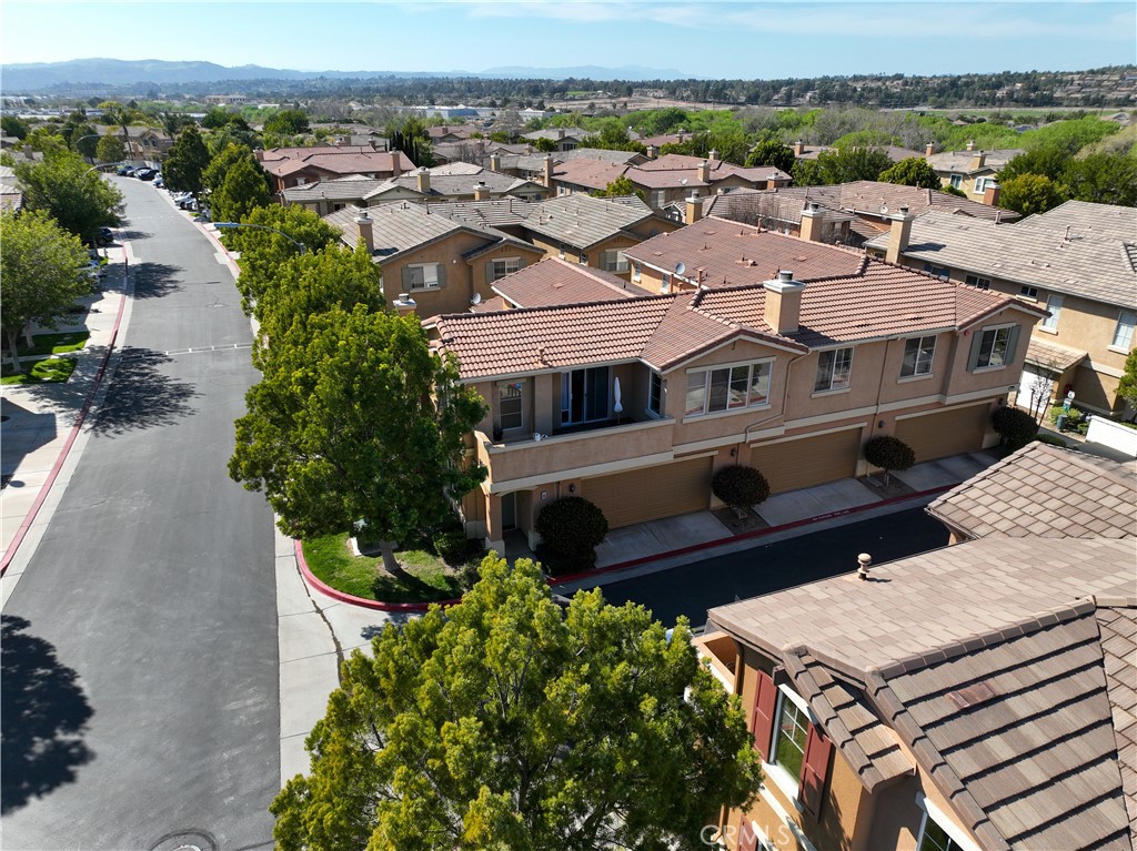 33570 Emerson Way, Unit C Temecula, CA 92592 - Photo 40 of 52 an aerial view of residential houses with outdoor space