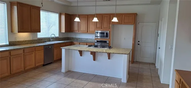 a view of kitchen island with wooden floor