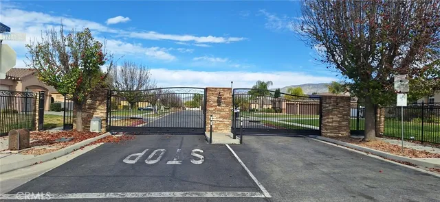 a view of a street with a building in the background