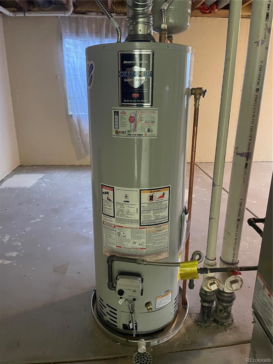 4399 Perth Circle Denver, CO 80249 - Photo 30 of 30 a close view of water heater