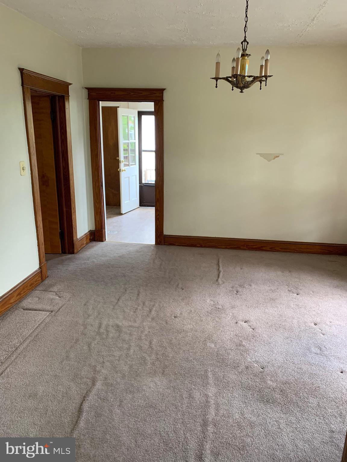 8211 Philadelphia Road Baltimore, MD 21237 - Photo 22 of 49 a view of a room with a ceiling fan