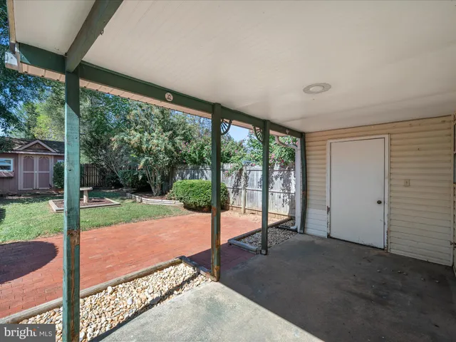 a view of a porch with a backyard