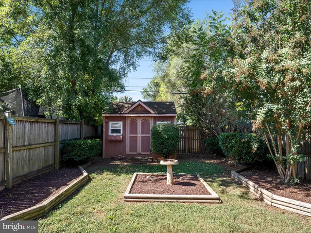 a front view of a house with yard