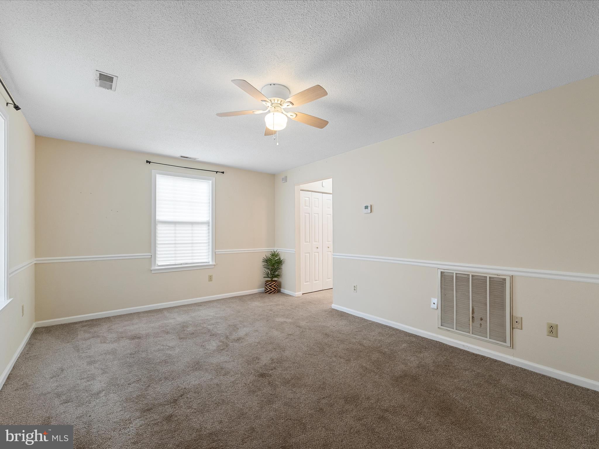 208 South Marshall Street Ranson, WV 25438 - Photo 5 of 28 a view of an empty room with a window