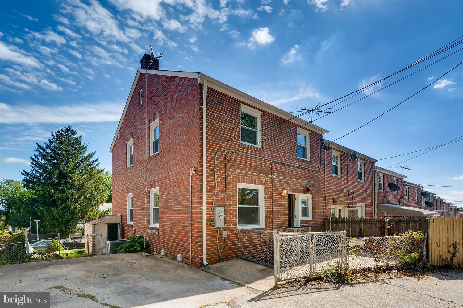 3834 Rexmere Road Baltimore, MD 21218 - Photo 28 of 28 a front view of a building with street view